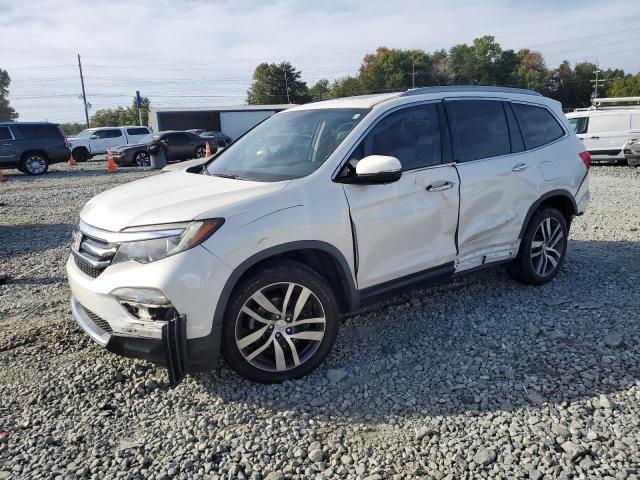 Photo 1 from auction – 2017 HONDA PILOT TOUR with VIN 5FNYF6H95HB075328