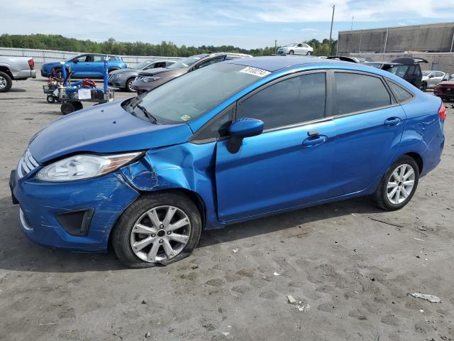 FORD FIESTA SE 2011 with VIN 3FADP4BJ3BM174838 - Photo from auction