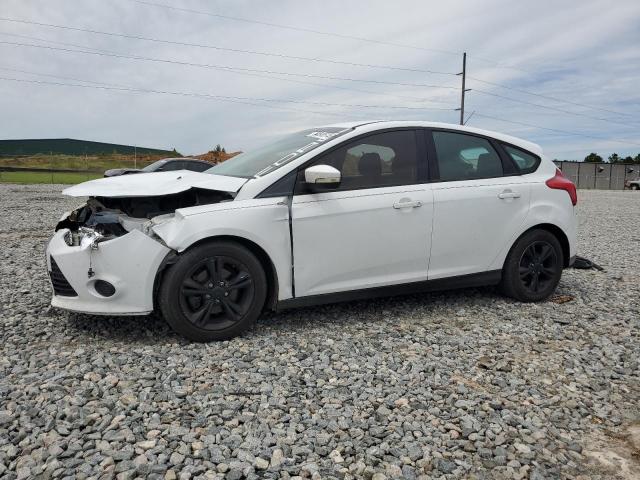 FORD FOCUS SE 2014 with VIN 1FADP3K23EL301077 - Photo from auction