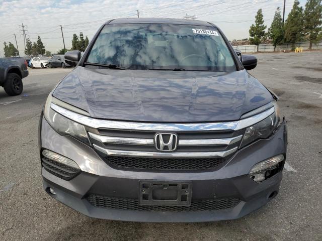 Photo 5 from auction – 2018 HONDA PILOT EXL with VIN 5FNYF5H59JB006154