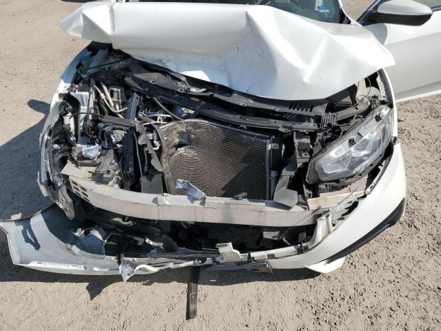 Photo 11 from auction – 2018 HONDA CIVIC LX with VIN 19XFC2F56JE033500