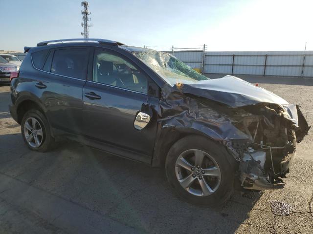Photo 4 from auction – 2015 TOYOTA RAV4 XLE with VIN JTMRFREV5FD163310