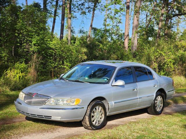 Photo 2 from auction – 2002 LINCOLN CONTINENTA with VIN 1LNHM97V52Y664176