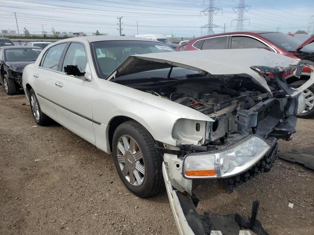 Photo 4 from auction – 2004 LINCOLN TOWN CAR U with VIN 1LNHM83W24Y629932