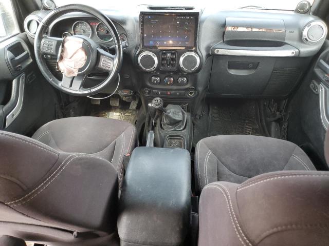 Photo 8 from auction – 2014 JEEP WRANGLER U with VIN 1C4BJWFGXEL163421