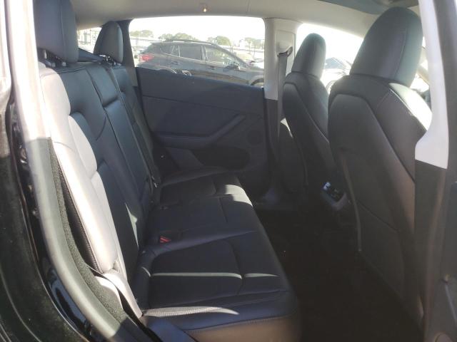Photo 11 from auction – 2023 TESLA MODEL Y with VIN 7SAYGDEE0PA174933