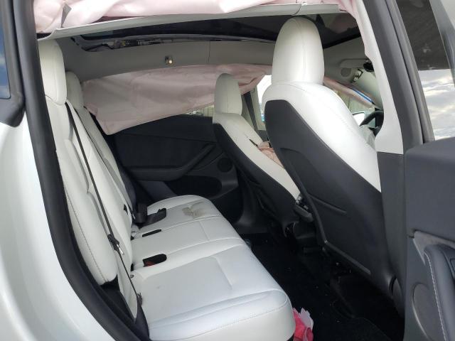 Photo 11 from auction – 2023 TESLA MODEL Y with VIN 7SAYGDEE0PF893389