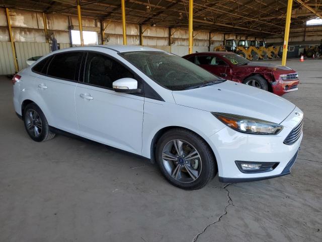 Photo 4 from auction – 2017 FORD FOCUS SE with VIN 1FADP3FE3HL206298