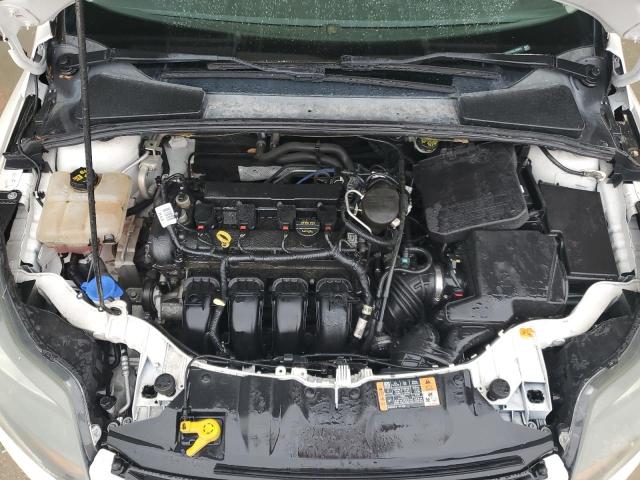 Photo 11 from auction – 2014 FORD FOCUS TITA with VIN 1FADP3J26EL329621