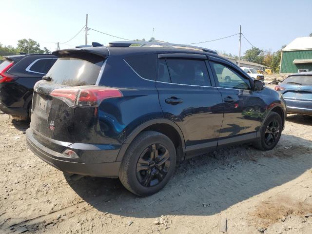 Photo 3 from auction – 2018 TOYOTA RAV4 LE with VIN JTMBFREV7JJ255031