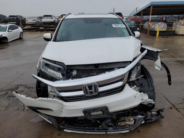 Photo 5 from auction – 2021 HONDA PILOT TOUR with VIN 5FNYF5H63MB006485