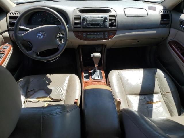 Photo 8 from auction – 2002 TOYOTA CAMRY LE with VIN 4T1BF30KX2U502497