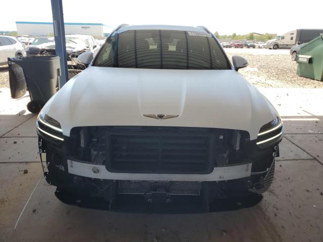 Photo 5 from auction – 2022 GENESIS GV70 BASE with VIN KMUMCDTC7NU038800