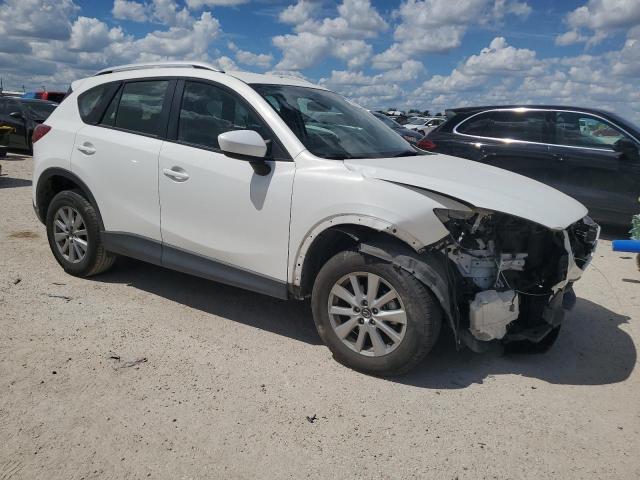 Photo 4 from auction – 2014 MAZDA CX-5 SPORT with VIN JM3KE2BE0E0417695