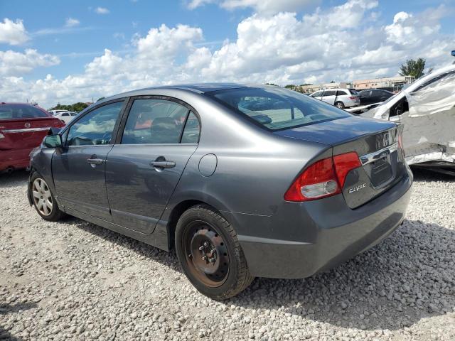 Photo 2 from auction – 2011 HONDA CIVIC LX with VIN 19XFA1F58BE016750