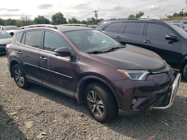 Photo 4 from auction – 2017 TOYOTA RAV4 XLE with VIN 2T3RFREV0HW690659