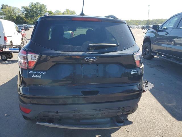 Photo 6 from auction – 2018 FORD ESCAPE SEL with VIN 1FMCU9HD3JUB18577