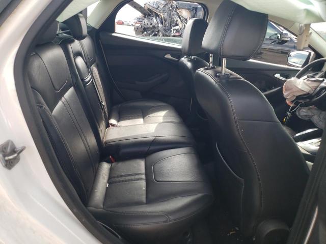 Photo 10 from auction – 2013 FORD FOCUS TITA with VIN 1FADP3J23DL199814