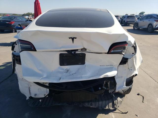 Photo 6 from auction – 2023 TESLA MODEL Y with VIN 7SAYGAEE7PF751927