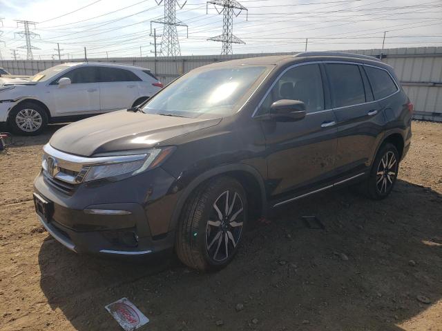 HONDA PILOT TOUR 2019 with VIN 5FNYF6H60KB089795 - Photo from auction