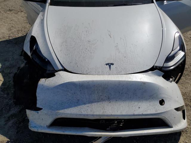 Photo 12 from auction – 2023 TESLA MODEL Y with VIN 7SAYGDEE6PF873860