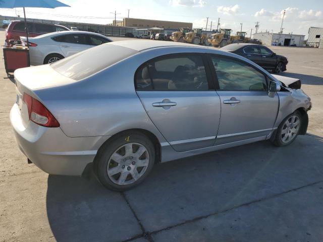 Photo 3 from auction – 2011 HONDA CIVIC LX with VIN 19XFA1F55BE041878