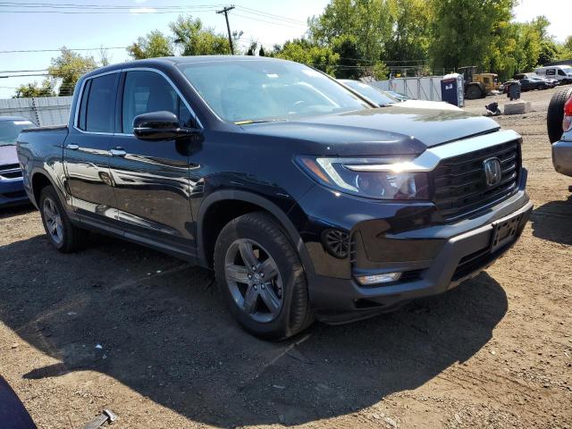 Photo 4 from auction – 2023 HONDA RIDGELINE with VIN 5FPYK3F72PB017243