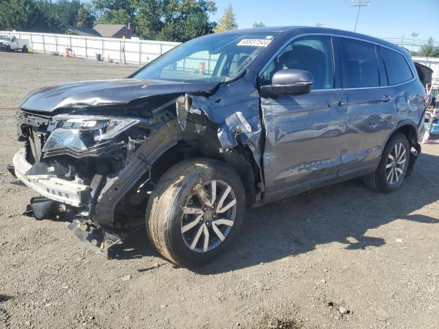 HONDA PILOT EXL 2021 with VIN 5FNYF6H56MB077404 - Photo from auction