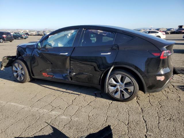 Photo 2 from auction – 2023 TESLA MODEL Y with VIN 7SAYGAEE7PF891413