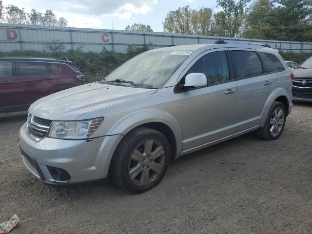 DODGE JOURNEY R/ 2011 with VIN 3D4PH6FG3BT569996 - Photo from auction