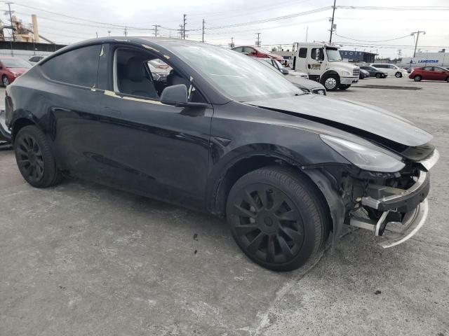 Photo 4 from auction – 2023 TESLA MODEL Y with VIN 7SAYGDEE3PF881513