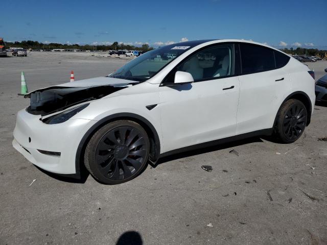 TESLA MODEL Y 2023 with VIN 7SAYGDEF8PF864666 - Photo from auction