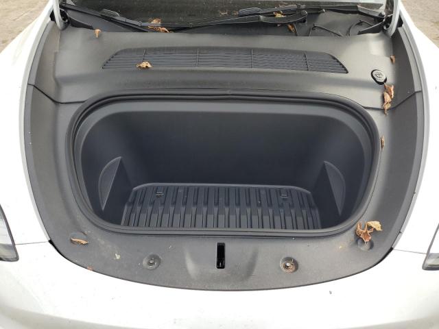 Photo 12 from auction – 2023 TESLA MODEL Y with VIN 7SAYGDEE8PA057536
