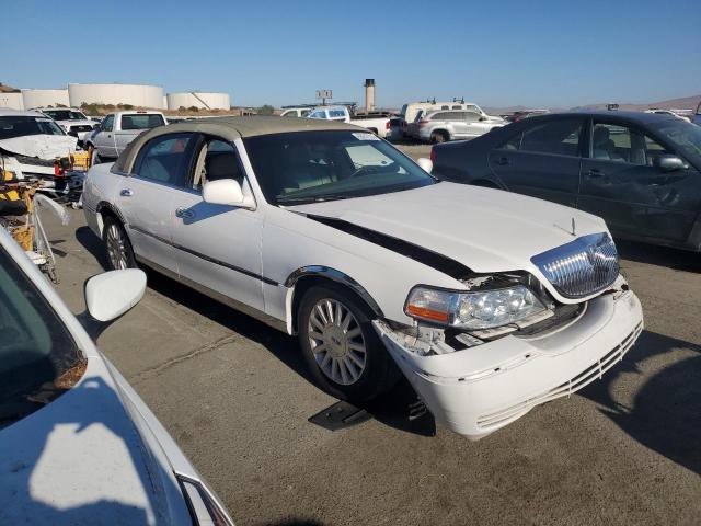 Photo 4 from auction – 2004 LINCOLN TOWN CAR E with VIN 1LNHM81W74Y669443