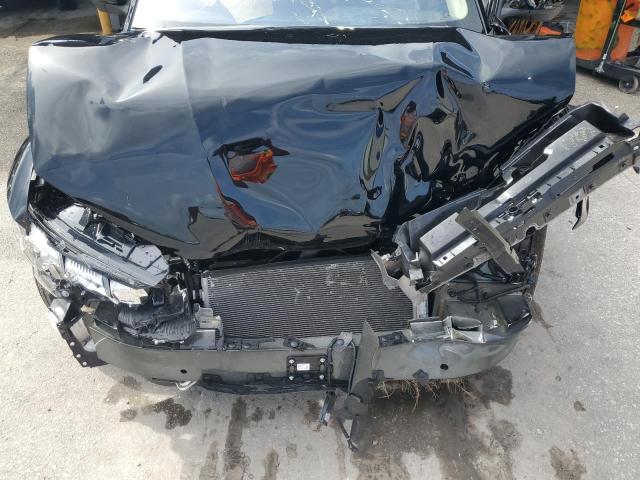 Photo 12 from auction – 2023 FORD MUSTANG MA with VIN 3FMTK3SU2PMA83572
