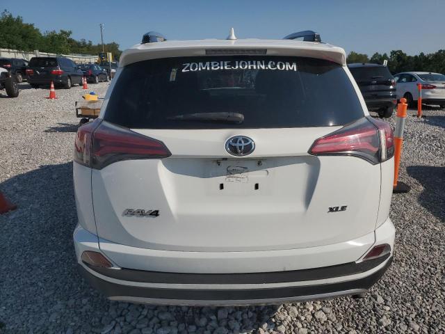Photo 6 from auction – 2017 TOYOTA RAV4 XLE with VIN JTMWFREV6HD095881