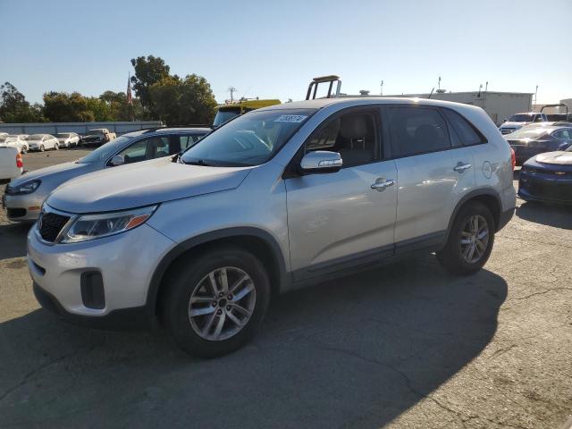 KIA SORENTO LX 2014 with VIN 5XYKT3A61EG486226 - Photo from auction