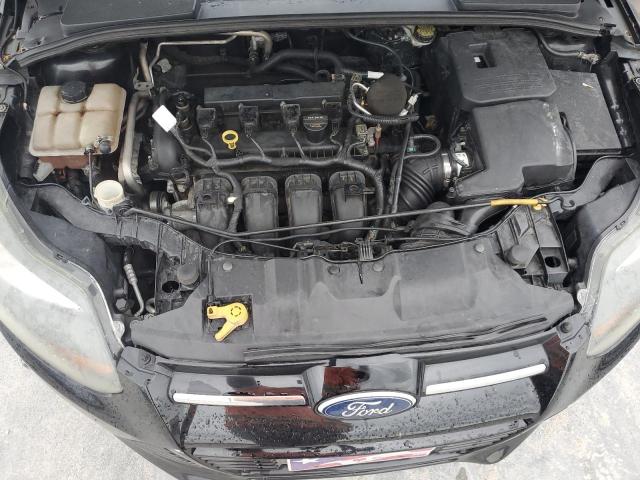Photo 11 from auction – 2012 FORD FOCUS TITA with VIN 1FAHP3J2XCL138413