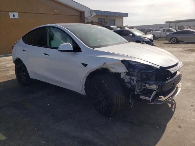 Photo 4 from auction – 2023 TESLA MODEL Y with VIN 7SAYGDEE6PF696873