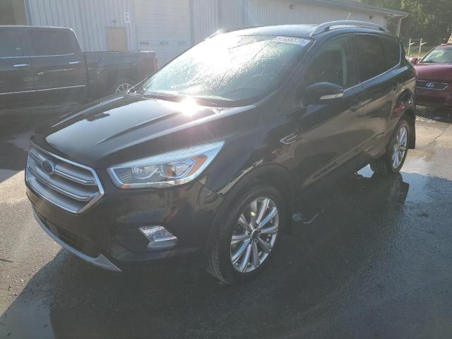 FORD ESCAPE TIT 2017 with VIN 1FMCU9J91HUC66629 - Photo from auction
