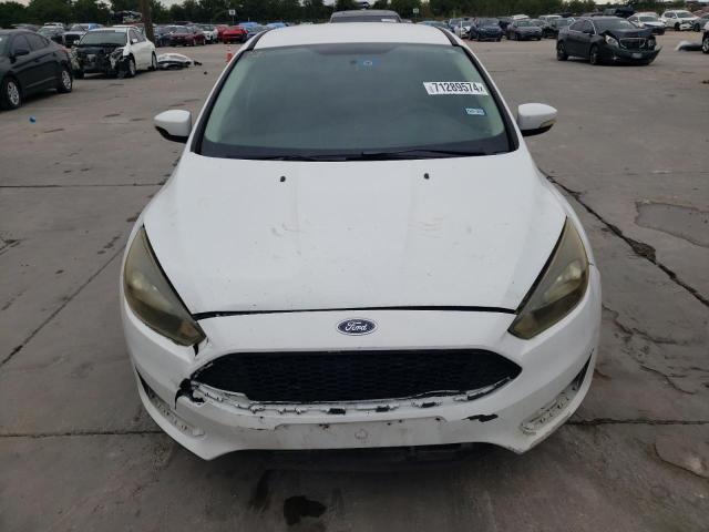 Photo 5 from auction – 2016 FORD FOCUS SE with VIN 1FADP3F27GL204008
