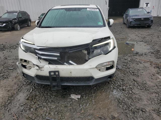 Photo 5 from auction – 2018 HONDA PILOT EXL with VIN 5FNYF6H52JB018684
