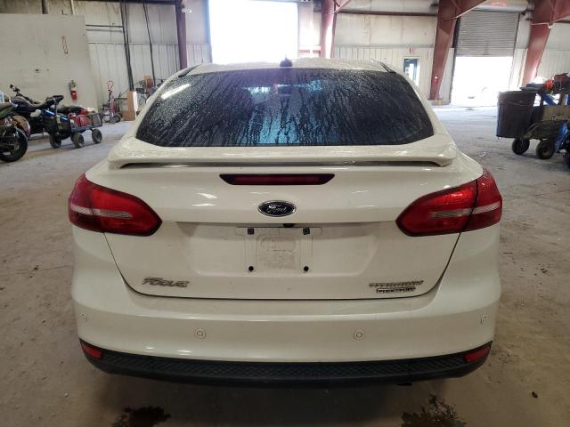 Photo 6 from auction – 2016 FORD FOCUS TITA with VIN 1FADP3J24GL341642