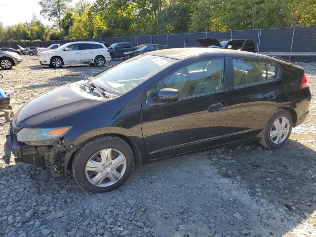 HONDA INSIGHT 2011 with VIN JHMZE2H3XBS008048 - Photo from auction