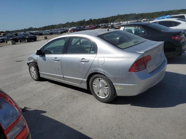 Photo 2 from auction – 2006 HONDA CIVIC HYBR with VIN JHMFA36216S019928