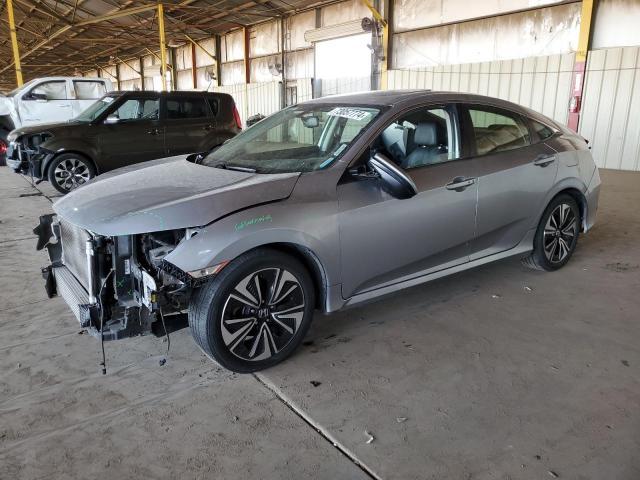 HONDA CIVIC EXL 2018 with VIN JHMFC1F77JX022080 - Photo from auction