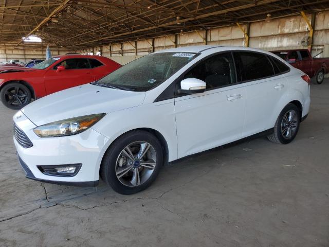 FORD FOCUS SE 2017 with VIN 1FADP3FE3HL206298 - Photo from auction