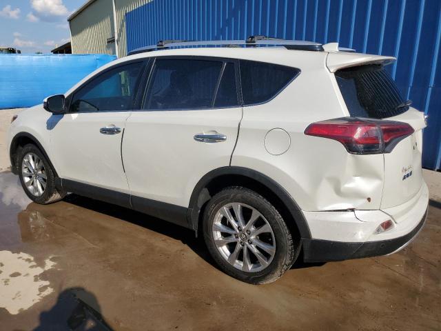 Photo 2 from auction – 2016 TOYOTA RAV4 LIMIT with VIN JTMYFREV2GJ063812