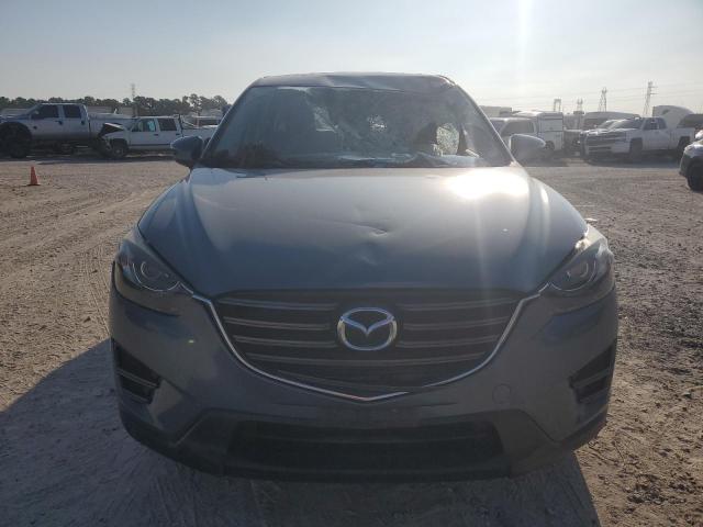 Photo 5 from auction – 2016 MAZDA CX-5 GT with VIN JM3KE2DY0G0798054