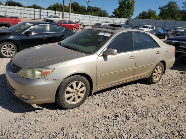 TOYOTA CAMRY LE 2003 with VIN 4T1BF32K43U555842 - Photo from auction